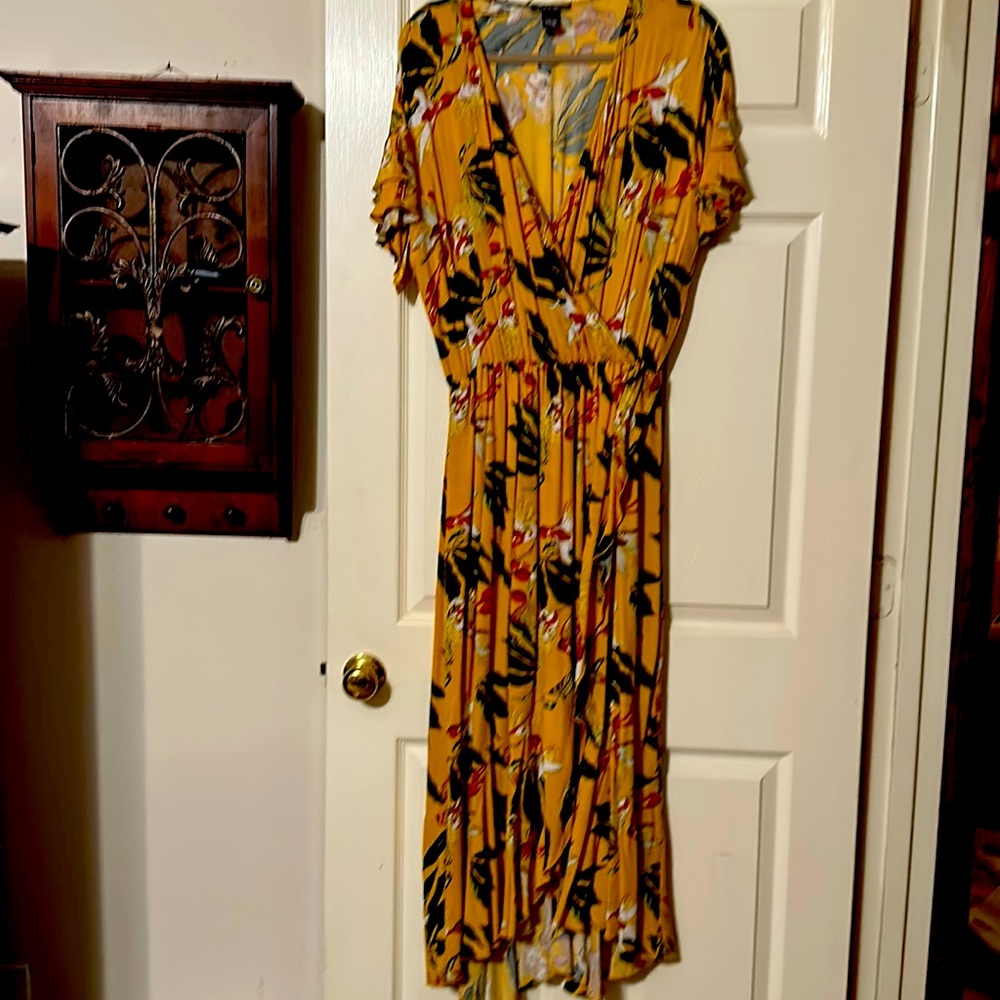 Beautiful gold dress with green, orange and white flowers throughout. New